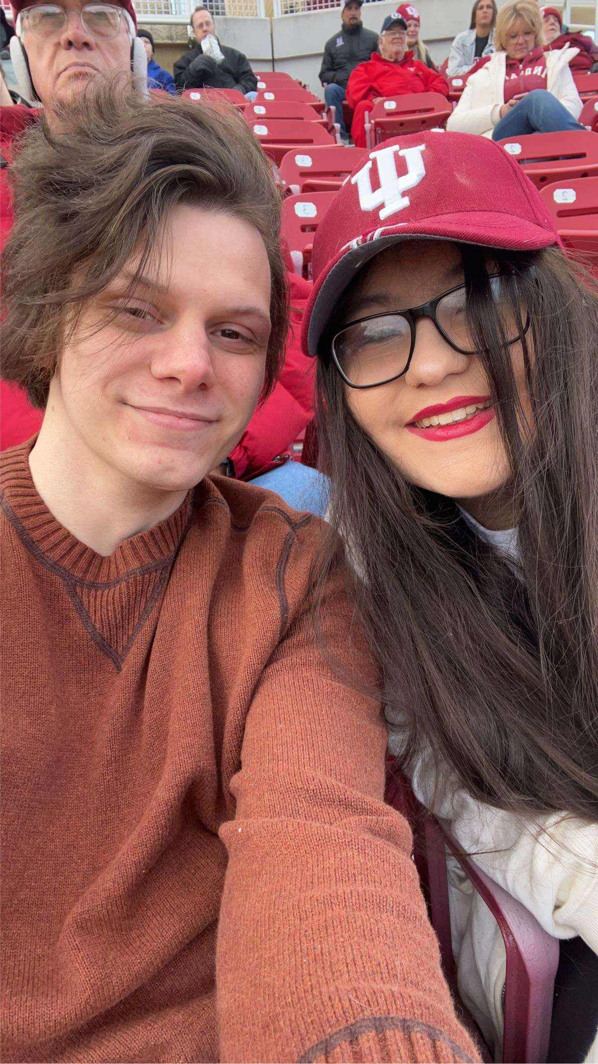 Briana and Ryan taking a selfie in stadium seating